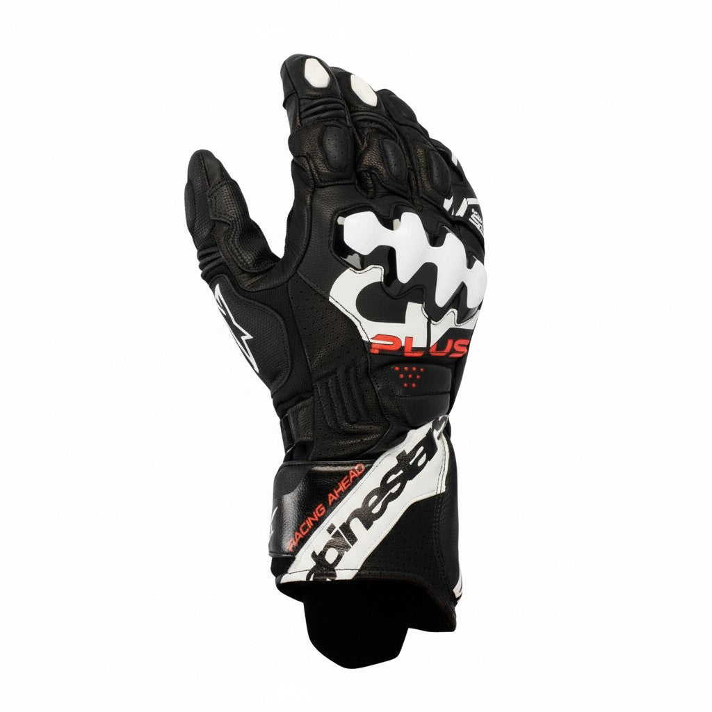 Black Alpinestars motorcycle glove with white and red branding on a white background