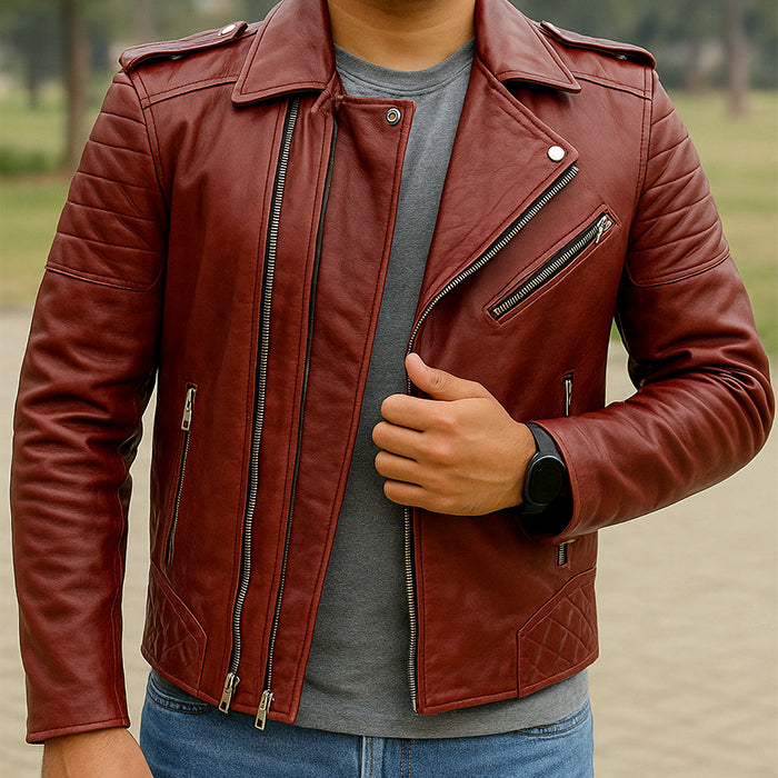 Person wearing a red leather jacket with a blurred outdoor background