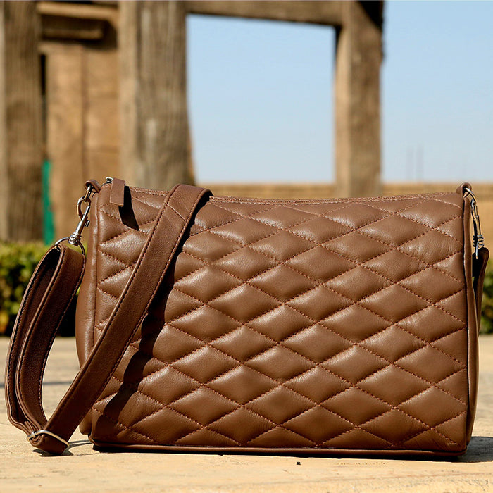 Ladies leather handbag, diamond cut shape bag