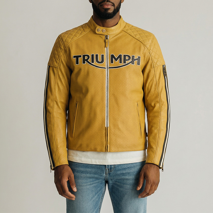 Yellow leather jacket with 'Triumph' branding worn by a person on a plain background