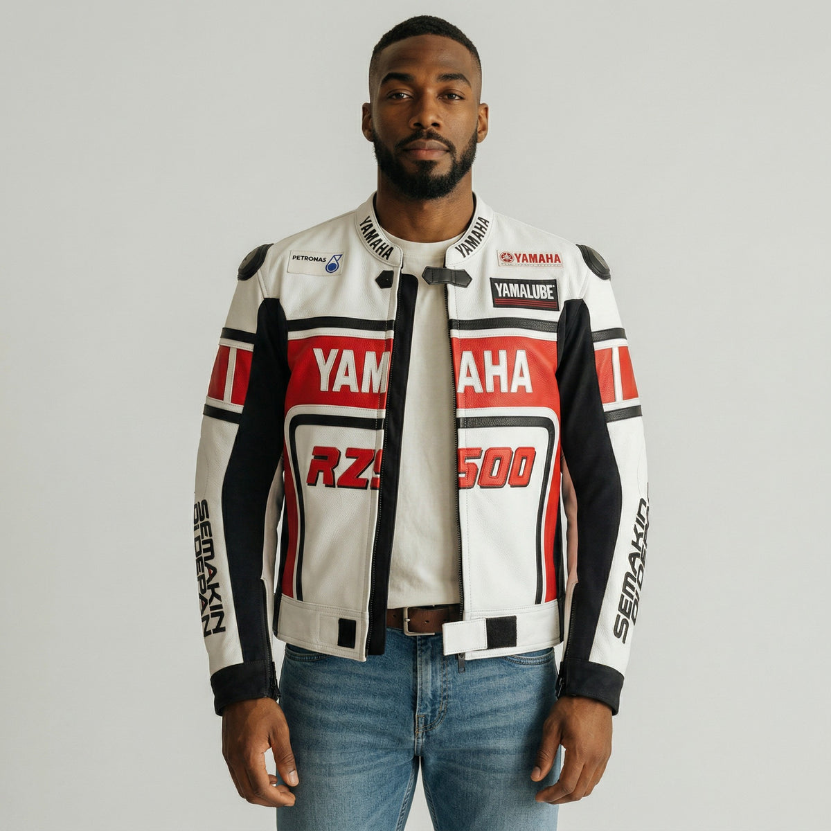 Man wearing a Yamaha rz500 branded jacket on a gray background