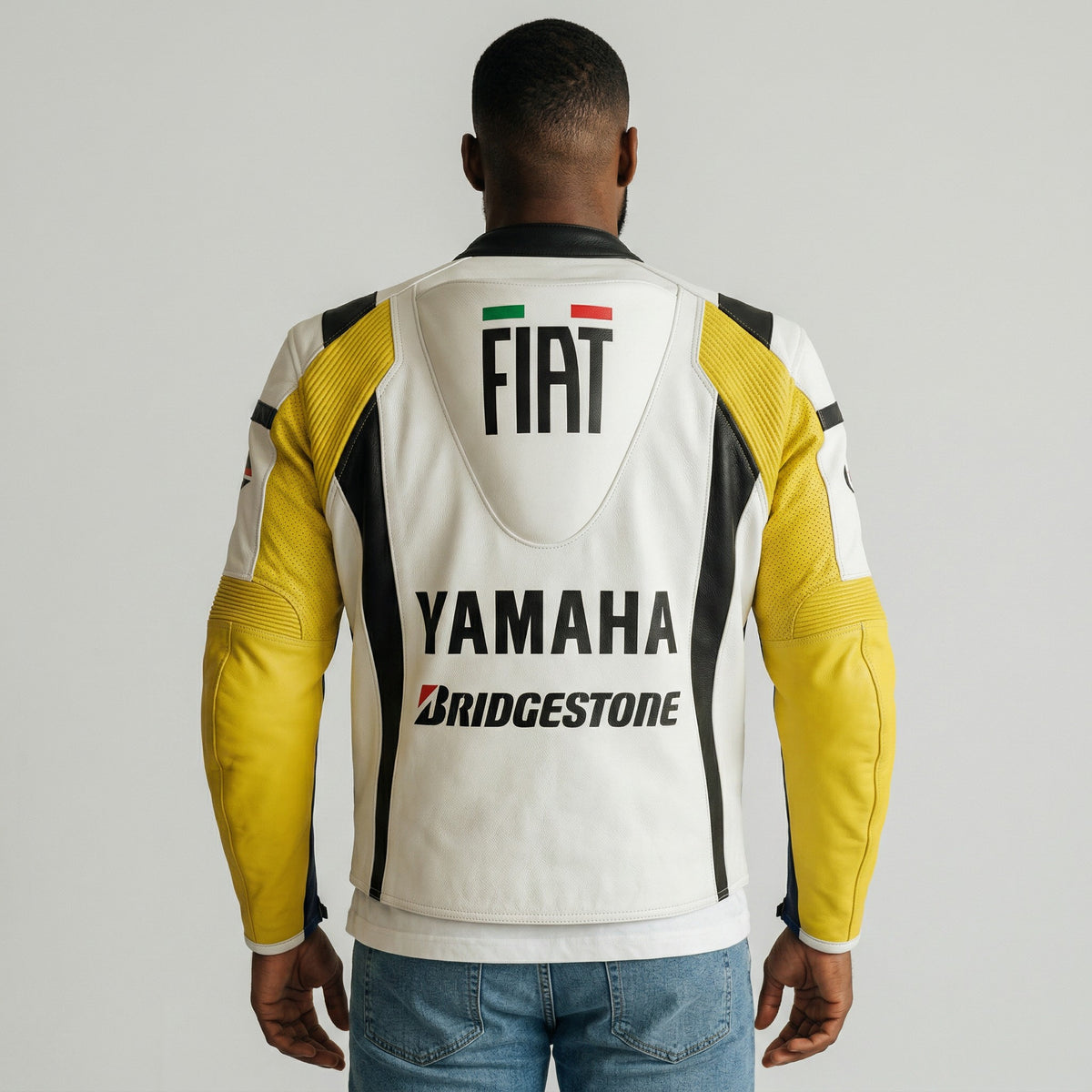 Person wearing a Yamaha branded motorcycle jacket with visible logos on a plain background